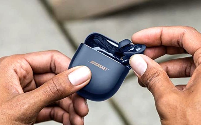 Hand Holding Bose QuietComfort Earbuds with Case