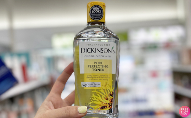 Hand Holding Dickinsons Original Witch Hazel Toner