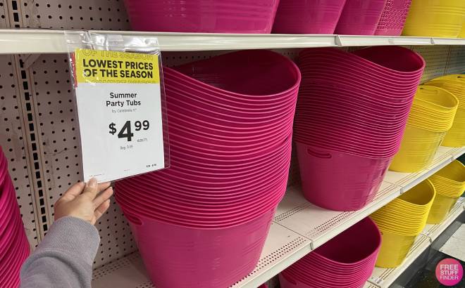 Hand Holding Price Sign for Large Pink Summer Tubs