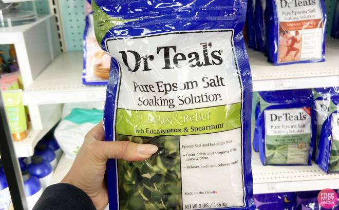 Hand Holding a Bag of Dr Teals Epsom Salt