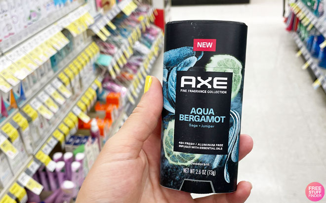 Hand Holding an Axe Deodorant