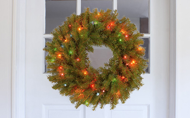 Pre Lit Artificial Christmas Wreath Attached to a Door