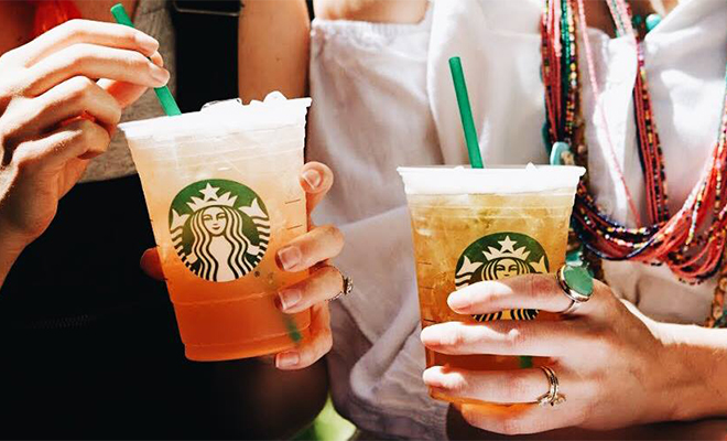 Two People Holding Starbucks Teavana Iced Teas