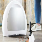 Woman Using EyeVac Home Touchless Sensor Activated Vacuum