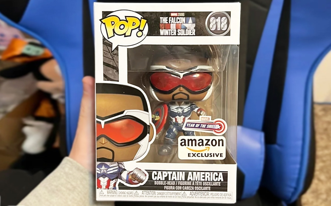 A Hand Holding Funko Pop Marvel Captain America 818 Sam Wilson