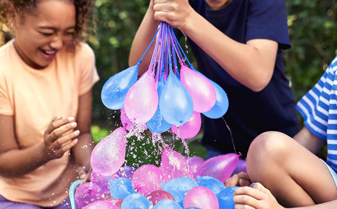 A Kid Holding Original Bunch O Balloons