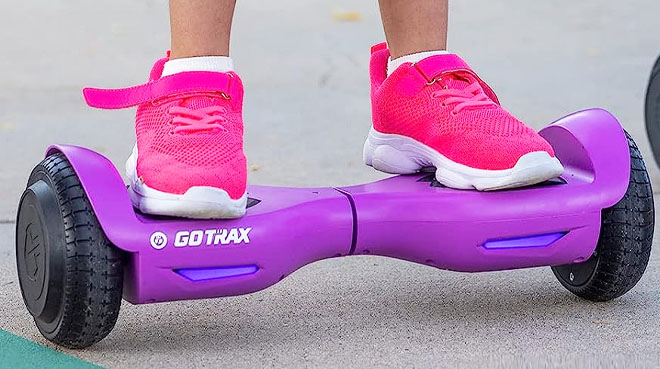 A Kid Riding Gotrax Hoverboard