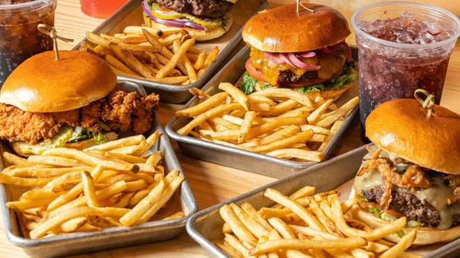 Big Buns Sandwiches Fries and Sodas on a Table