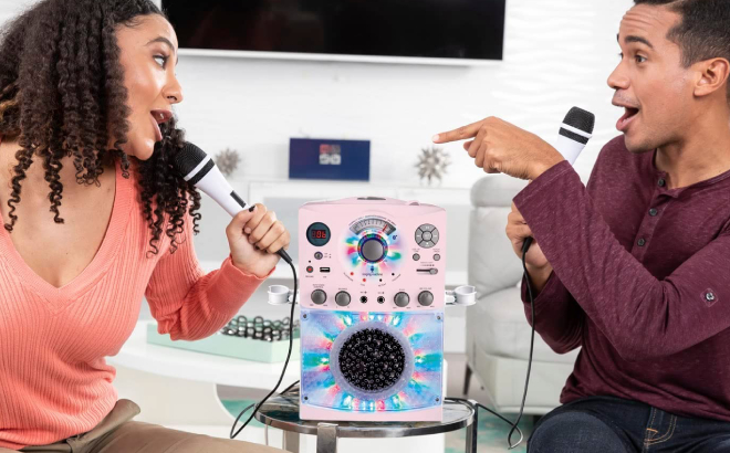 Couple Enjoy Singing on Their Portable Karaoke Machine