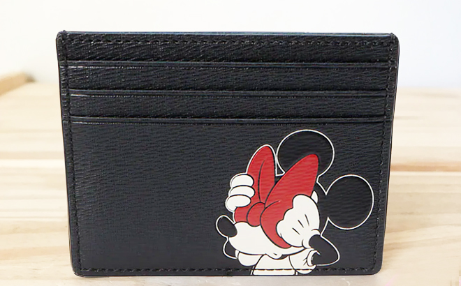 Disney X Kate Spade New York Minnie Card Holder in Black Multi Color On the Table