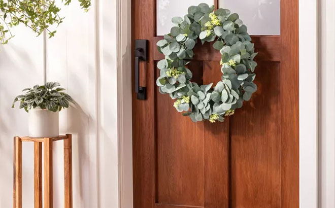 Faux Seeded Eucalyptus with Berry Wreath Hung on a Front Door