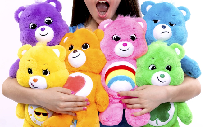 Girl Holding Six Care Bears