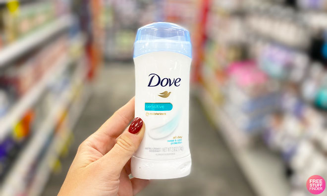 Hand Holding Dove Antiperspirant Deodorant Stick Sensitive