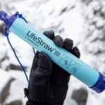 Hand Holding LifeStraw Personal Water Filter