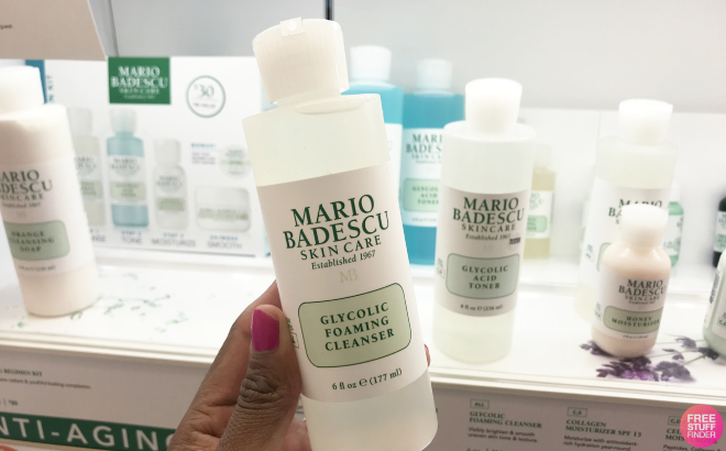 Hand Holding a Bottle of Mario Badescu Glycolic Foaming Cleanser