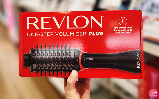 Hand Holding a Revlon Volumizer Box