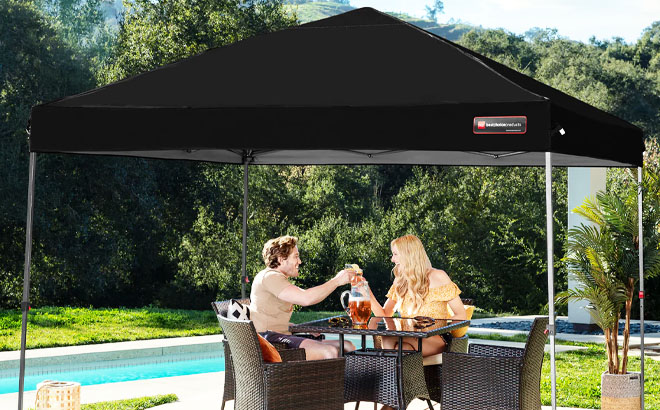 Man and Woman under the Instant Pop Up Canopy