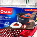 O Cedar Spin Mop and Bucket System box on cart