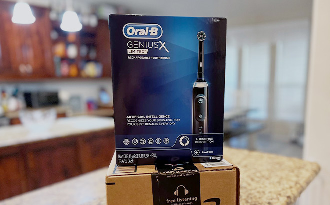 Oral B Genius X Limited Toothbrush on top of a Prime Box