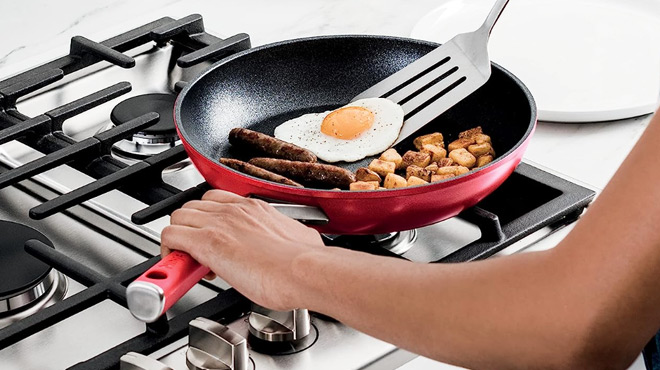 Person Cooking in a Ninja Foodi NeverStick Vivid Fry Pan