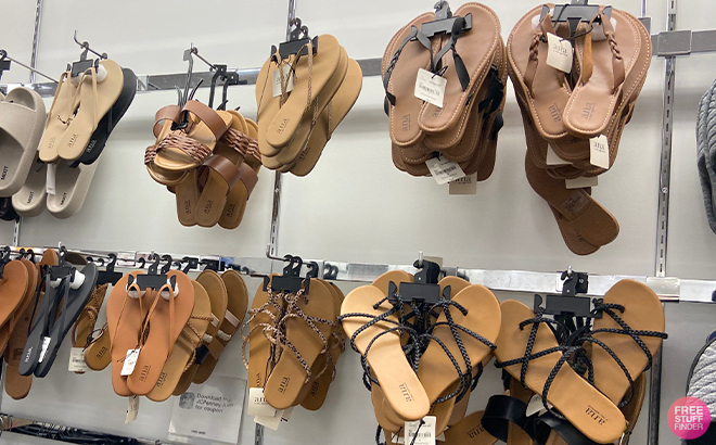 Several Styles of Womens Sandals on Hangers