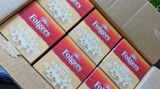 Six Boxes of Folgers French Vanilla Flavored Coffee K Cups Inside a Shipping Box