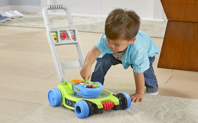 Vtech pop and Spin Mower Role Play Lawn Mower