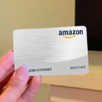 Woman hand holding the Amazon Store Card