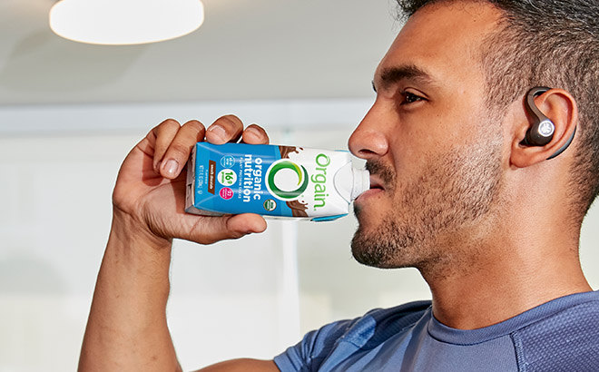 a Man Drinking a Orgain Organic Nutrition Protein Shake