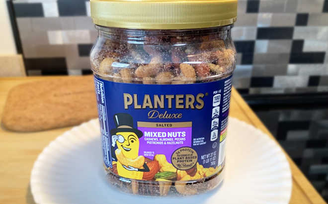 A Jar of Planters Deluxe Salted Mixed Nuts Canister