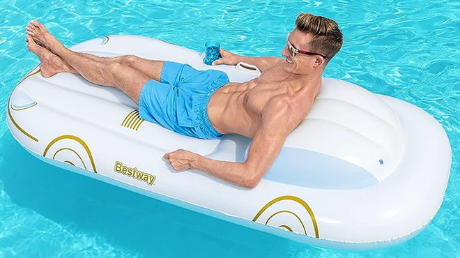 A Man on Bestway H2OGO Vacation Cruiser Lounge Pool Float