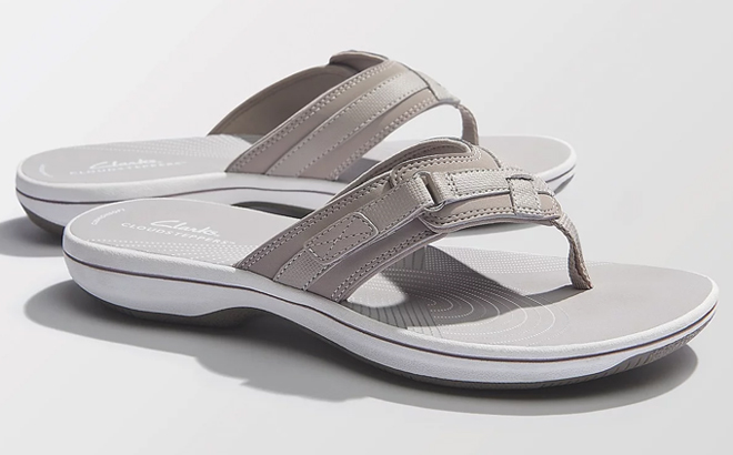 A Pair of Clarks Cloudsteppers Sport Thong Sandals