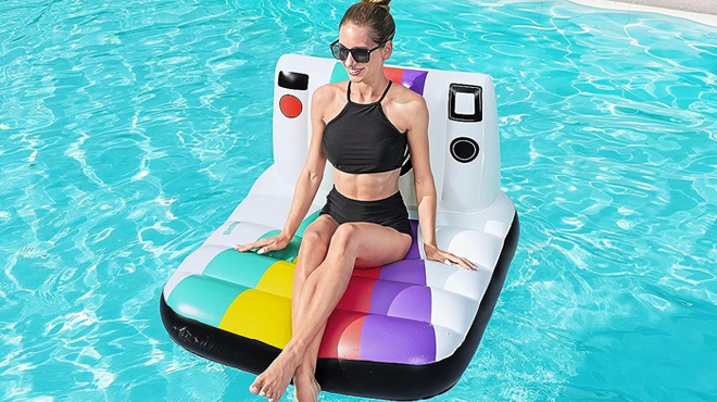 A Woman Sitting on Bestway Pose n Float Lounge Float