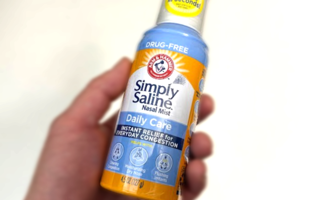 Hand holding Arm and Hammer Simply Saline Nasal Mist