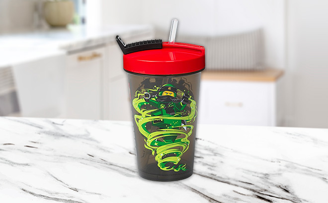 LEGO Ninjago Red Green Tumbler Straw on the kitchen table