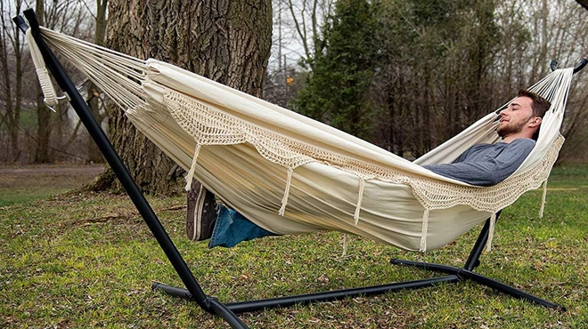 Man Resting on the Vivere 2 Person Hammock with Stand