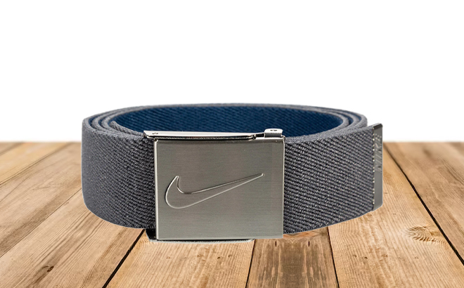 Nike Mens Reversible Belt on a Table