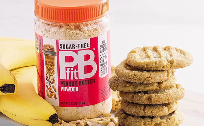 PBfit Sugar Free Peanut Butter Powder with Cookies and Bananas on the Sides