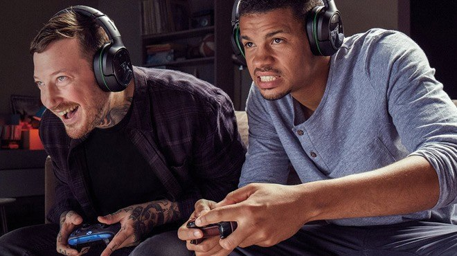 Two Men Playing Xbox Gaming Console