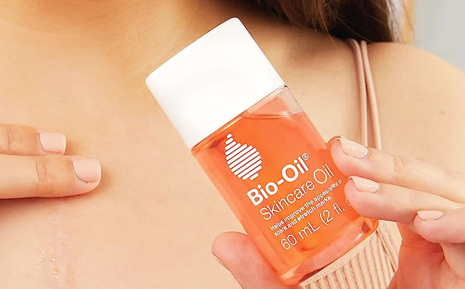 Woman Holding Bio Oil Skincare Body Oil