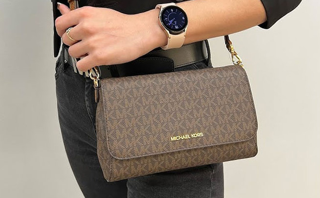 Woman Wearing Michael Kors Medium Logo Convertible Crossbody Bag