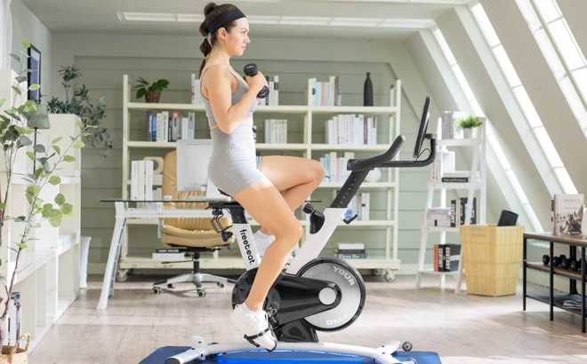 Woman Working Out on a Freebeat Exercise Bike