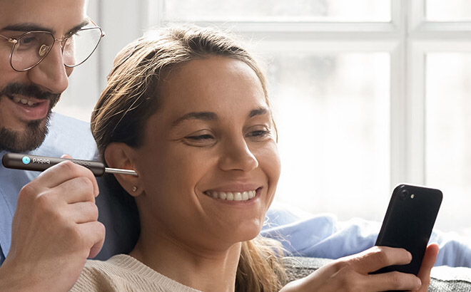 a Couple Using a BEBIRD R1 Ear Wax Removal Tool