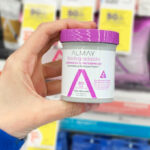 a Hand Holding Almay Makeup Remover Pads