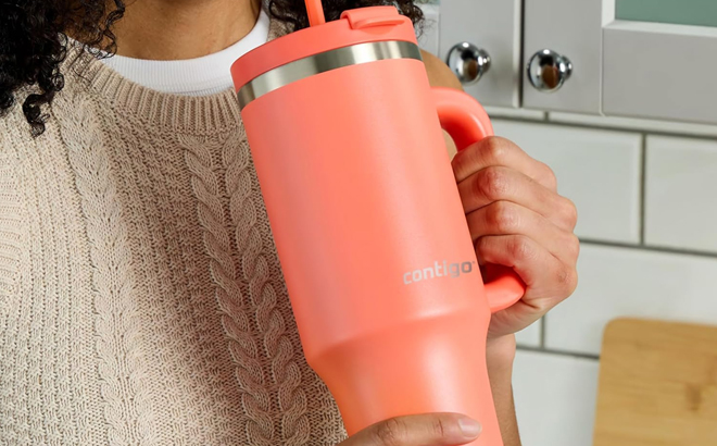 A Woman Drinking from Contigo Streeterville 40 Ounce Tumbler