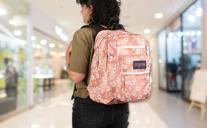 A Woman Wearing a JanSport Big Student Backpack