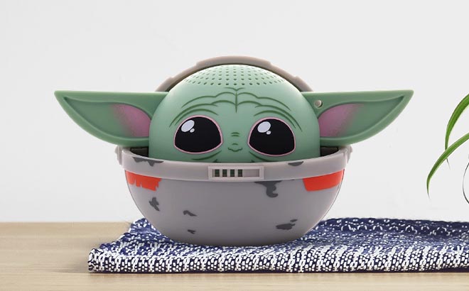 Bitty Boomers Star Wars The Mandalorian Grogu in Pram Speaker on table