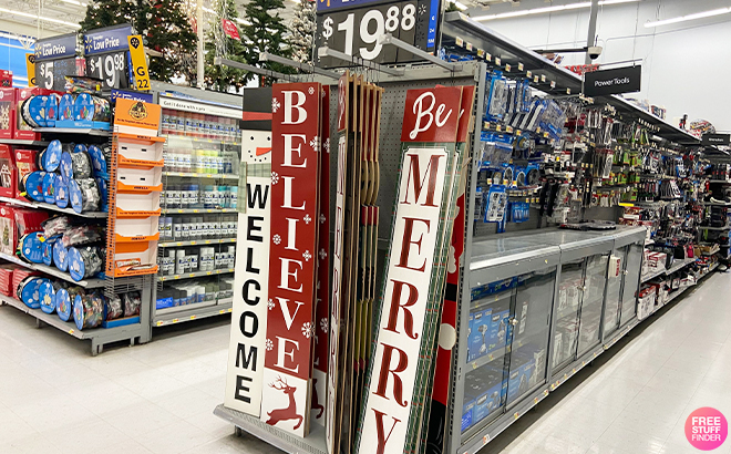 Christmas Big Signs on a Shelf at Walmart