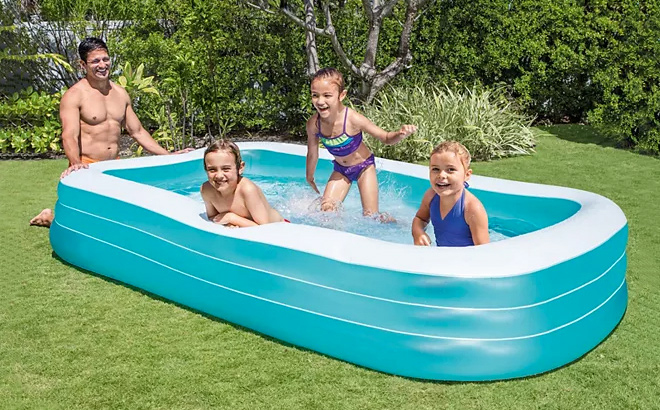 Dad and Kids Playing in the Intex Swim Center Family Inflatable Pool