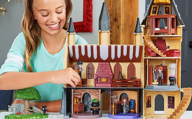 Girl Playing with Wizarding World Harry Potter Magical Minis Playset